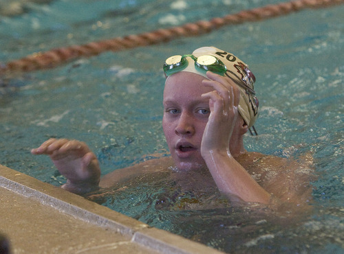 Al Hartmann  |  The Salt Lake Tribune
Murray High School swim team is having one of its best seasons.   Team captain McKenzie Pollei takes a rest after swimming sprints on Friday December 30.