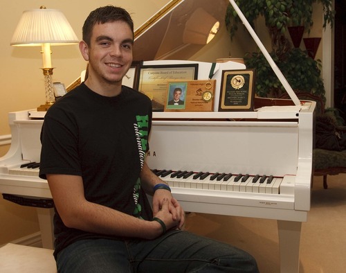 Leah Hogsten | The Salt Lake Tribune  
Brent Mabey, 18, is one of 28 Hillcrest High School graduates who will receive an International Baccalaureate diploma on Jan. 2. Time he spent playing the piano counted towards hours he needed to demonstrate 