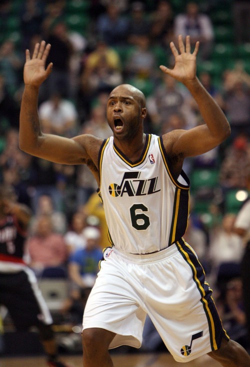 Steve Griffin  |  The Salt Lake Tribune

Utah's Jamaal Tinsley holds his hands in the air claiming he didn't tip the ball out of bounds during second half action of the Utah Jazz versus Portland Trail Blazers game at EnergySolutions Arena in Salt Lake City, Utah Wednesday, December 21, 2011. The refs agreed with him reversing their original call after watching a video replay.
