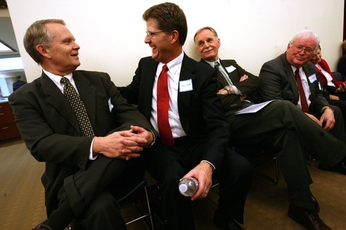 Leah Hogsten | The Salt Lake Tribune  
South Jordan City  mayoral candidates Scott Osborne (left) and Mark Woolley (center) share a laugh with the other 17 candidates waiting in a room to address the council. Osborne had made an earlier joke that although he was number 13 in line to address the council, he had never been a suspicious person. South Jordan City Council chose Scott Lee Osborne to lead the city as mayor, Tuesday, January 3, 2012, replacing Kent Money, who is stepping down. All 19 applicants spoke at Tuesday's council meeting.