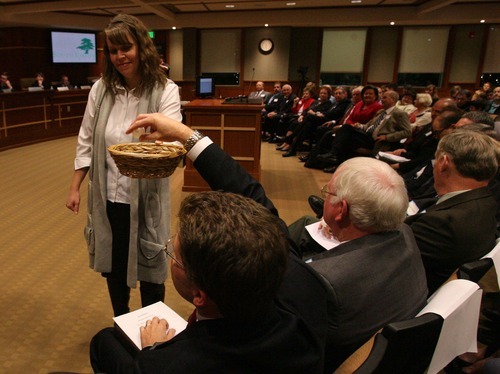Leah Hogsten | The Salt Lake Tribune  
South Jordan City mayoral candidate pick a pingpong ball from a basket to determine the order in which they were to give a 3-minute address to the council. South Jordan City Council chose Scott Lee Osborne to lead the city as mayor, Tuesday, January 3, 2012, replacing Kent Money, who is stepping down. All 19 applicants spoke at Tuesday's council meeting.