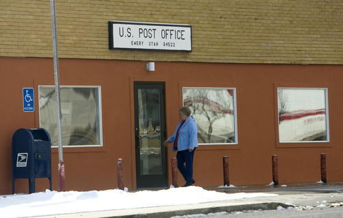 Al Hartmann  |  The Salt Lake Tribune
An Emery resident enters the town's post office, which could close.  Residents who do business and receive medications through the mail would have to drive 15 miles north to Ferron to collect their mail.