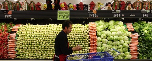 Steve Griffin  |  The Salt Lake Tribune
Alejandro Nava stocks white corn at Rancho Markets at 900 E. 3300 South in Salt Lake City. It is the seventh store in the chain.