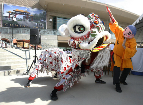 Rick Egan   |  Tribune file photo
Performers show the traditional Lion Dance at the groundbreaking ceremony for the Chinese Heritage Gate at the Utah Cultural Celebration Center in West Valley City on July 26, 2011.