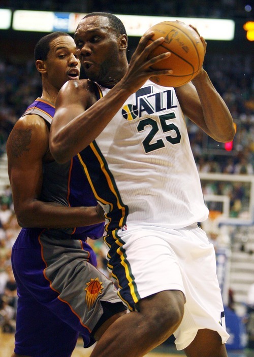 Djamila Grossman  |  The Salt Lake Tribune

Utah Jazz center Al Jefferson #25 pushes past Phoenix Suns center Channing Frye #8 at a game in Salt Lake City, Thursday, October 28, 2010. The Jazz lost the game.