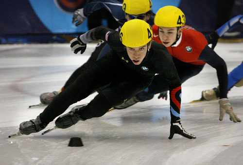 Scott Sommerdorf  |  The Salt Lake Tribune             
Joshua Cummings (416), leads Claude Gilbert (438) through a turn in the Men's 1500 meters semi-final on the second day of the U.S. short-track speedskating championships at the Utah Olympic Oval, in Kearns, Saturday, January 7, 2012.