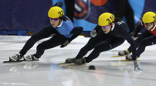 Scott Sommerdorf  |  The Salt Lake Tribune             
Lana Gehring (321), leads Katherine Reuter (310) through the lst turn before the bell lap in the Senior Ladies 1500 meters final on the second day of the U.S. short-track speedskating championships at the Utah Olympic Oval, in Kearns, Saturday, January 7, 2012. Gehring won the final with a time of 2:35.222. Emily Scott was second with a time of 2:35.634.