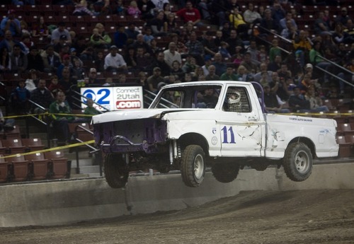 Kim Raff I The Salt Lake Tribune
Tabitha Pritchard gets some air during the Tough Trucks race at the Monster Truck Winter Nationals at the Maverik Center in West Valley City, Utah on January 7, 2012.
