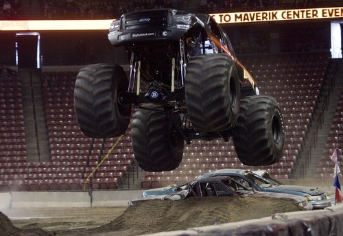 Kim Raff I The Salt Lake Tribune
Bigfoot races another truck during the Monster Truck Winter Nationals at the Maverik Center in West Valley City, Utah on January 7, 2012.