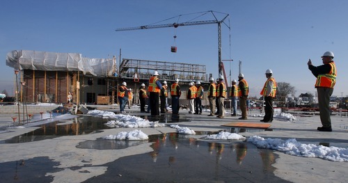 Steve Griffin  |  The Salt Lake Tribune

City officials and others tour the ongoing construction of the new Granger High School in West Valley City on Monday, Jan. 9, 2012. The new school is scheduled to open for the 2013 school year and is being built next to the existing high school.