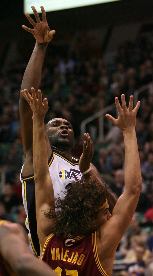 Steve Griffin  |  The Salt Lake Tribune

Utah's Al Jefferson shoots over Cleveland's Anderson Varejao during second half action in the Jazz Cleveland game at EnergySolutions Arena in Salt Lake City, Utah  Tuesday, January 10, 2012.
