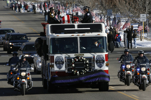 Francisco Kjolseth  |  The Salt Lake Tribune
Thousands turn up to pay their respects for slain Ogden police Officer Jared Francom along the funeral procession route in Ogden on Wednesday, January 11, 2012.