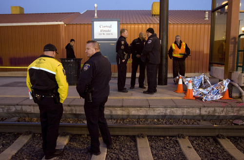 Kim Raff |The Salt Lake Tribune
South Salt Lake and UTA Police investigate an accidenton the southbound red line at the UTA Trax Central Pointe Station in South Salt Lake City, Utah on January 12, 2012.