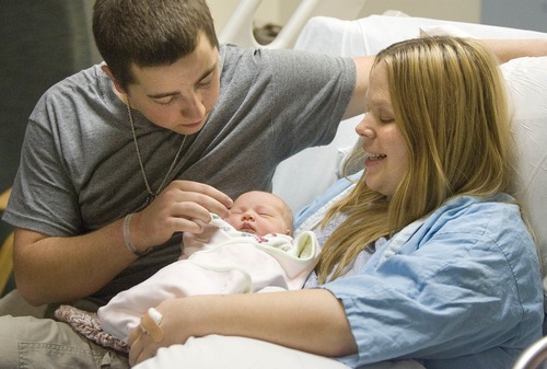 Paul Fraughton  |  The Salt Lake Tribune.
Caleb and Tammy New with their newborn daughter, Alicia, who was born Thursday at the University of Utah Hospital. Tammy New is the first female Utah Veteran to receive all her maternity care at the VA medical center in Salt Lake City.