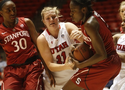 Chris Detrick  |  The Salt Lake Tribune
Utah's Taryn Wicijowski (11) fights for the ball with Stanford's Chiney Ogwumike (13) and Stanford's Nnemkadi Ogwumike (30) during the game at the Huntsman Center Thursday January 12, 2012. Stanford won the game 62-43.