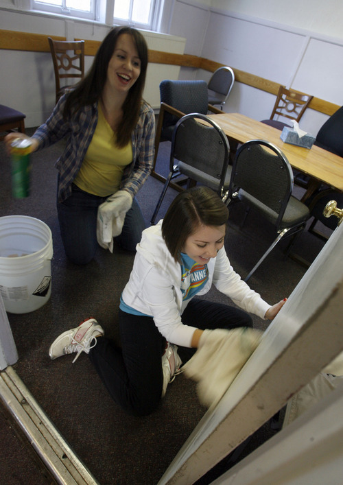 Francisco Kjolseth  |  The Salt Lake Tribune
Volunteers Anadine Burrell, left, and Allie Schulte volunteer their time to clean do a deep clean at the substance abuse treatment center, First Step House in Salt Lake City on Saturday, January 14, 2012.  University of Utah's Lowell Bennion Community Service Center and Black Student Union host the annual Martin Luther King Jr. Day of Service. Volunteers split up to do four different service projects around the city, including at the First Step House on Grant Street.