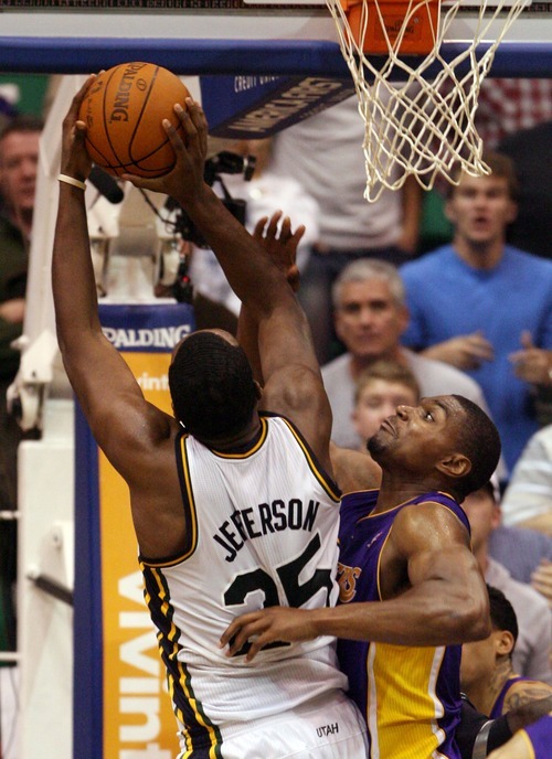 Steve Griffin  |  The Salt Lake Tribune

Andrew Bynum, of the Lakers, blocks Al Jefferson's last second shot during second half action of the Jazz versus Lakers game at EnergySlutions Arena in Salt Lake City, Utah  Wednesday, January 11, 2012.