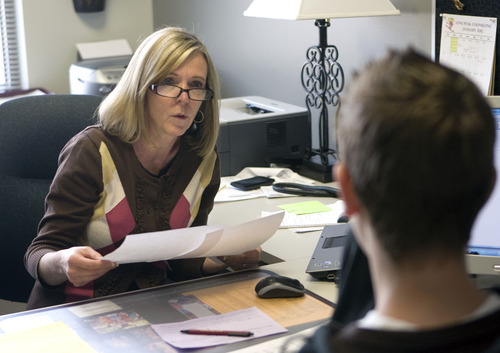 Al Hartmann  |  The Salt Lake Tribune
Lone Peak High School counselor Valerie Ross works with a student on his class schedule. Some say too few counselors is one reason more students aren't ready for college.