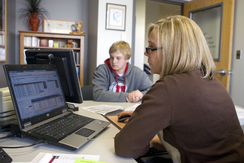 Al Hartmann  |  The Salt Lake Tribune
Lone Peak High School counselor Valerie Ross helps a student add more classes to his schedule. She also informs students of scholarships and college opportunites.