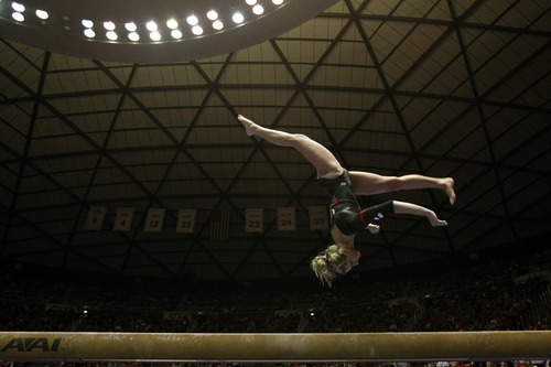 Chris Detrick  |  The Salt Lake Tribune
Mary Beth Lofgren competes on the beam during the gymnastics meet against Utah State at the Huntsman Center Friday January 13, 2012.