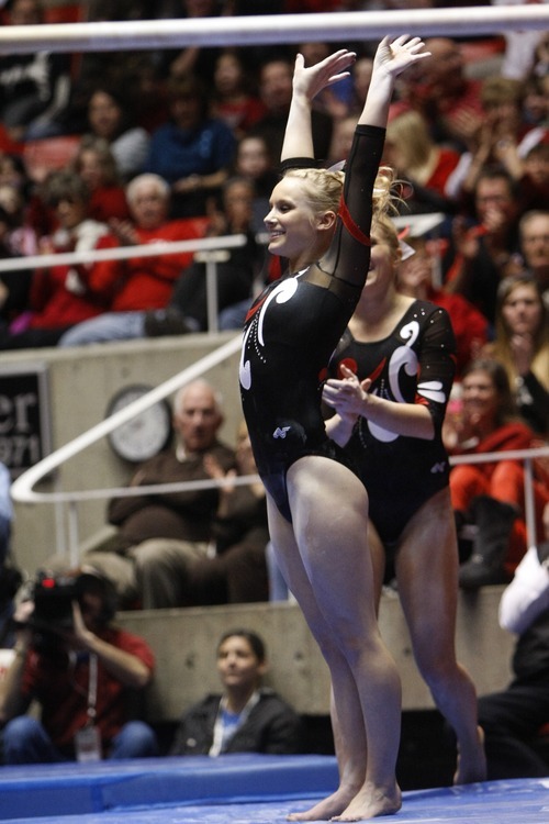 Chris Detrick  |  The Salt Lake Tribune
Georgia Dabritz competes on the bars during the gymnastics meet against Utah State at the Huntsman Center Friday January 13, 2012.