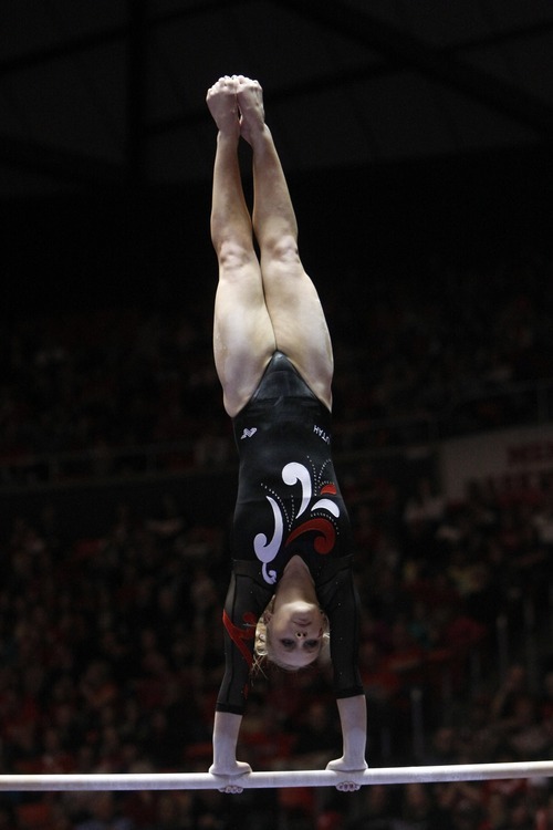 Chris Detrick  |  The Salt Lake Tribune
Georgia Dabritz competes on the bars during the gymnastics meet against Utah State at the Huntsman Center Friday January 13, 2012.