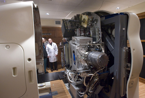 Rick Egan  | The Salt Lake Tribune 
Guests check out the Gamma West Cancer Services' TomoTherapy machine during an open house Friday at St. Mark's Hospital to showcase new image-guided radiation therapy technology.