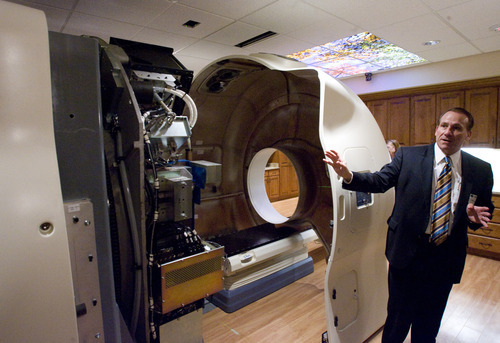 Rick Egan  | The Salt Lake Tribune 
Dave Vincent talks about the Gamma West Cancer Services' TomoTherapy machine during an open house at St. Mark's Hospital to showcase new image-guided radiation therapy technology Friday.