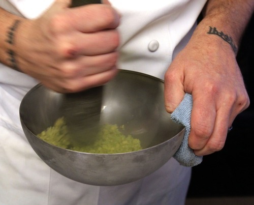 Rick Egan  | The Salt Lake Tribune 

Chef Gavin Baker stirs a pistachio sponge cake mixed with liquid nitrogen into a bowl in his test kitchen. The Mist Project, his 
