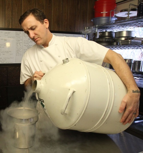 Rick Egan  | The Salt Lake Tribune 
Chef Gavin Baker pours liquid nitrogen into a bowl in his test kitchen. The Mist Project, his 