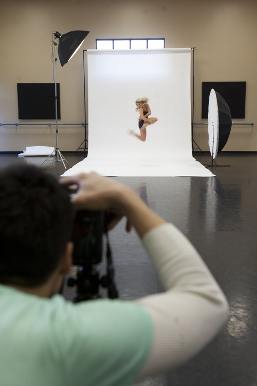 Trent Nelson  |  The Salt Lake Tribune
Chris Peddecord is a dancer who also specializes in photographing dancers. Peddecord photographed Emma Bennett and other performers from Odyssey Dance Theatre at The Point Performing Arts Academy in Highland on Friday, Dec. 16, 2011.