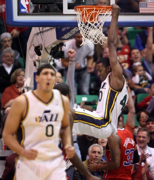 Steve Griffin  |  The Salt Lake Tribune


Utah's Enes Kanter, left, reacts as Jeremy Evans throws down a dunk as the Jazz pull away during second half action of the Utah Jazz versus Los Angeles Clippers game at EnergySolutions Arean in Salt Lake City, Utah  Tuesday, January 17, 2012.