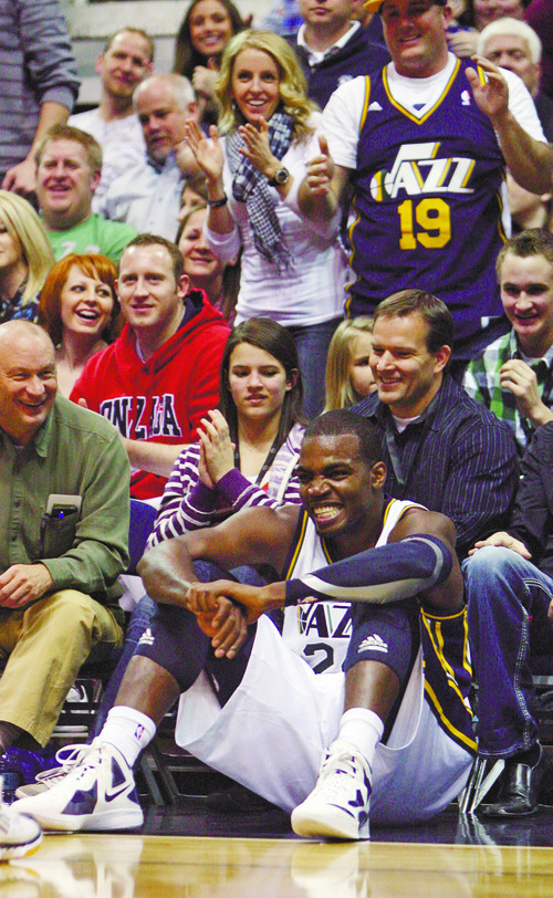 Kim Raff |The Salt Lake Tribune
Utah Jazz player Paul Millsap sits in the crowd at the end of the first half reacting to the big lead over the New Jersey Nets at EnergySolutions Arena in Salt Lake City on Saturday.