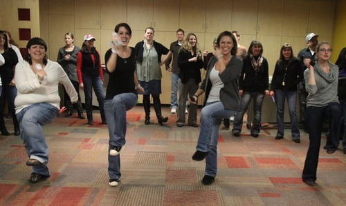 Rick Egan  | The Salt Lake Tribune 

CHG employees play Wii at their office in Salt Lake Thursday. CHG rose from 27th last year to 9th in Fortune's 2012 list of top 100 businesses to work for.