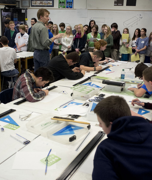 Trent Nelson  |  The Salt Lake Tribune
Highland High School teacher Scott Thomas gives 8th grade students from Hillside Middle School an overview of his Industrial Design class in Salt Lake City, Utah, Tuesday, January 10, 2012. The field trip is a unique approach to make the transition from middle school to high school easier for students and ensures that their 8th graders are better equipped to make wise and useful class choices when registering for high school.