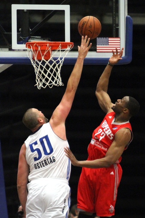 Rick Egan  | The Salt Lake Tribune 

Greg Ostertag (50) blocks a shot by Stanley Asumnu (23) of the Vipers,  in NBA D League action,  Texas Legends Vs. The Rio Grande Valley Vipers, at Dr Pepper Arena in Frisco, Texas, Thursday, December 29, 2011.