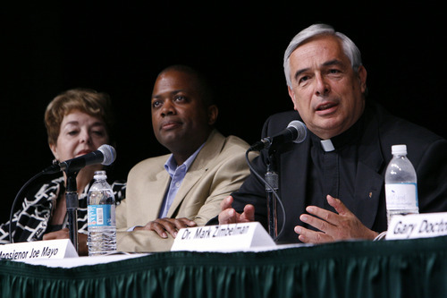 File photo Francisco Kjolseth  |  The Salt Lake Tribune
Monsignor Joe Mayo, right, speaks at the 2010 Fraud College alonside other panel members, including Paula Jojola-Brog and Pastor Berney Anderson about how the faith community is not inmune to fraud. This year the LDS Church is sending a representative to the Feb. 15 evebt at the University of Utah.