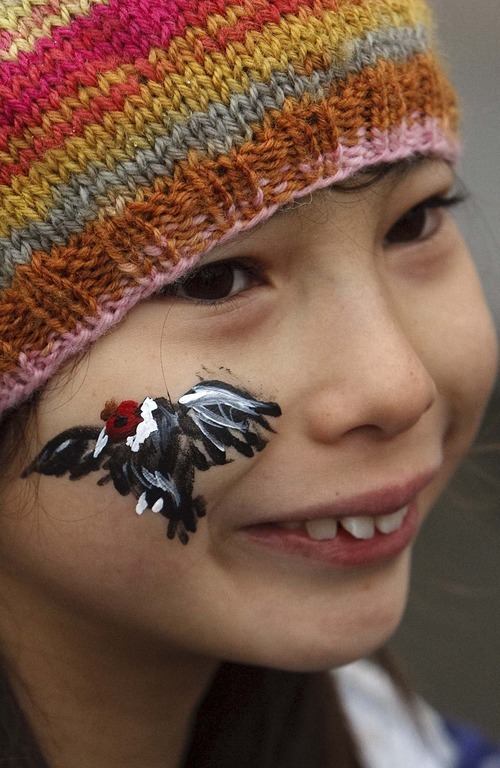 Leah Hogsten  |  The Salt Lake Tribune
 Mica Wheeler, 8, shows off her  Andy, the Andean Condor face painting from Tracy Aviary while celebrating Andy's  53rd birthday with the public with games, crafts, and cake Saturday, January 21, 2012 at the aviary.