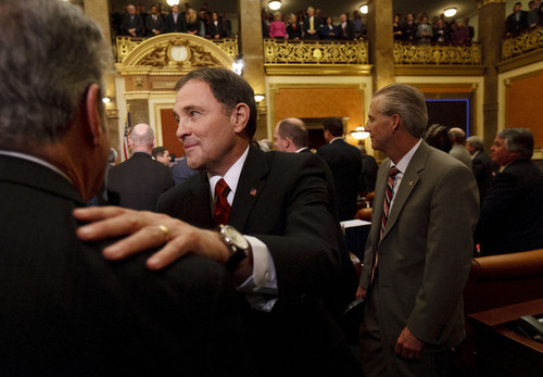 Trent Nelson  |  The Salt Lake Tribune
Utah Gov. Gary Herbert shakes hands with legislators after delivering the State of the State address in the House Chamber Wednesday.