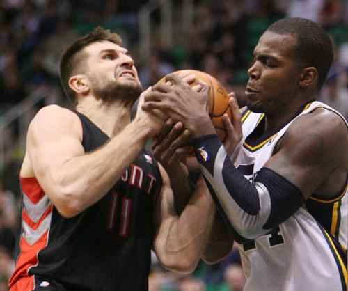 Steve Griffin  |  The Salt Lake Tribune


Utah's Paul Millsap, right, grabs the ball from Toronto's Linas Kleiza during overtime of the Jazz versus Raptors game at EnergySolutions Arena in Salt Lake City, Utah  Wednesday, January 25, 2012.