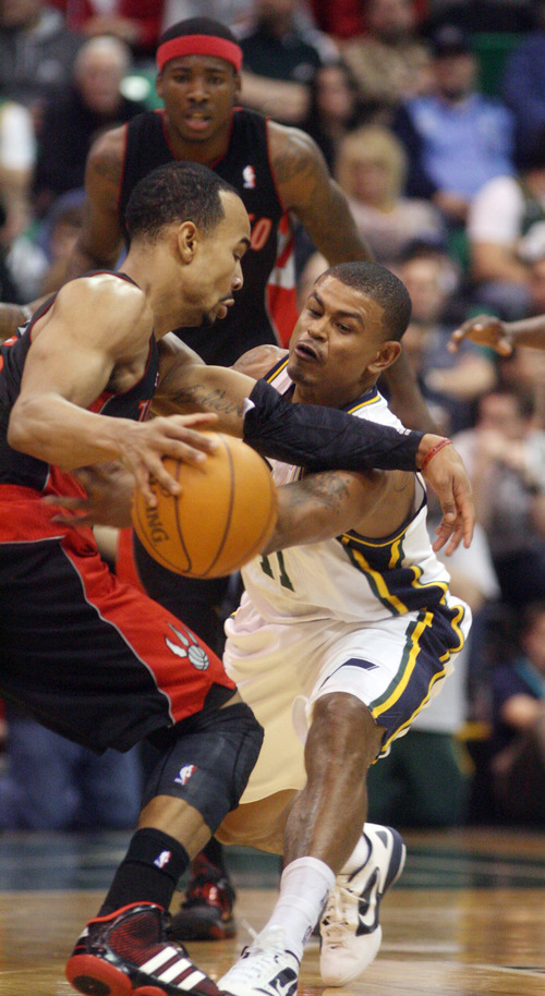 Steve Griffin  |  The Salt Lake Tribune


Utah's Earl Watson tries to poke the ball away from Toronto's Jerryd Bayless during first half action in the JAzz versus Raptors game at EnergySolutions Arena in Salt Lake City, Utah  Wednesday, January 25, 2012.