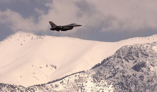 Tribune file photo
An F-16 takes off from Hill Air Force Base. The Air Force has announced a restructuring of its civilian workforce, which state leaders say will mean the elimination of jobs at the northern Utah base.