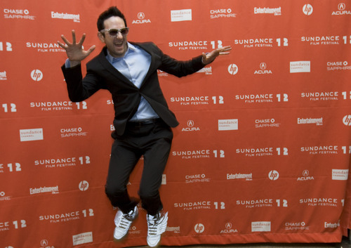 Kim Raff | The Salt Lake Tribune
Actor Brian Berrebbi jumps in the air while posing for photographs on the red carpet before the premiere of 