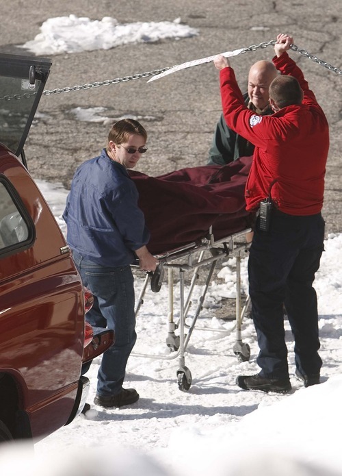 Leah Hogsten  |  The Salt Lake Tribune
Medical Examiners take away the body of a skier who was killed in an avalanche. One person died in an avalanche in the backcountry between Big and Little Cottonwood canyons late Saturday, January 28, 2012.  A group of three people were skiing on Kessler Ridge, an area that drops down into Mineral Fork Canyon in Big Cottonwood Canyon, when the avalanche was triggered at about 11:30 a.m. Wasatch Backcountry Rescue and several other crews searched the area with dogs and were able to eventually locate the victim. Hoyal said the skier was found dead at the scene at about 12:45 p.m.