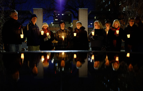 Trent Nelson  |  The Salt Lake Tribune
A candlelight vigil was held at the Episcopal Church Center on Friday marking the Day of Remembrance for Downwinders in Salt Lake City. The event marked more than six decades of nuclear weapons tests and the impacts they had on people around the West. Nearly 1,000 nuclear weapons were detonated at the Nevada Test Site during the Cold War, and they sent clouds of radioactive fallout across the United States, exposing a generation of Americans to radiation.