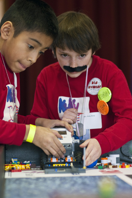 Chris Detrick  |  The Salt Lake Tribune
Victor DeLeon and José Garcia, of team 'Kuku Birds,' compete during the Utah FIRST LEGO League Championship at the University of Utah Saturday January 28, 2012. Hundreds of kids ages nine to 14 -- winners from regional meets -- competed at the University of Utah, racing to complete missions with team robots and presenting research projects.