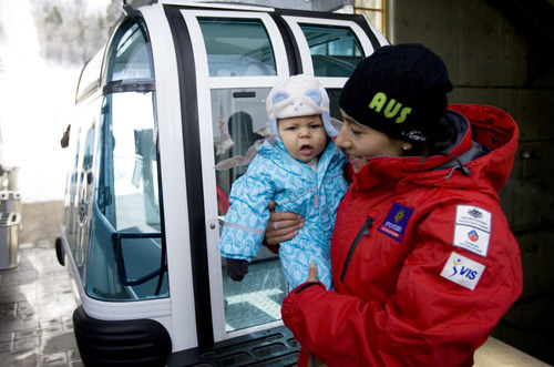 Kim Raff |The Salt Lake Tribune
Lydia Lassila while holding her son Kai Lassila inspects the gondola cabin named after her for the Needles Gondola Lift at Snowbasin Ski Resort in Ogden, Utah on January 29, 2012.  Lassila is having the cabin dedicated to her for her 2010 Olympic gold medal in aerial skiing. She is part of the Australian Women's Aerial Ski team, known as 