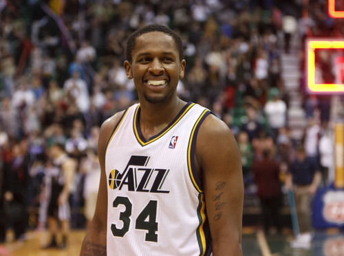Trent Nelson  |  The Salt Lake Tribune
Utah Jazz guard/forward C.J. Miles (34) celebrates the win with a smile Saturday after the Jazz beat Sacramento 96-93 at the EnergySolutions Arena in Salt Lake City.