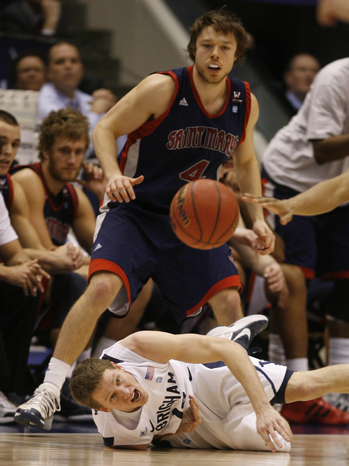 Rick Egan  | The Salt Lake Tribune 

St. Mary's Gaels guard Matthew Dellavedova (4) and Brigham Young Cougars guard, Brock Zylstra (13) watch the ball bounce down court, in basketball action,  BYU vs. St Mary's in the Marriott Center in Provo, Saturday, January 28, 2012.