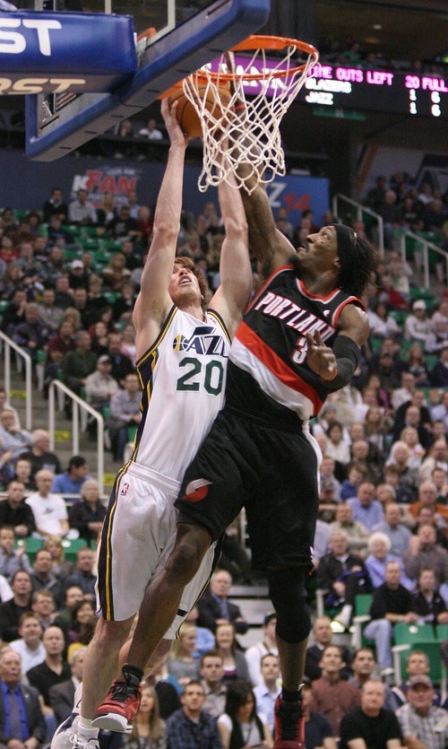 Paul Fraughton | The Salt Lake Tribune.
Gordon Hayward's shot is  blocked by Gerald Wallace of the Trail Blazers The Utah Jazz played Portland at Energy Solutions Arena.
 Monday, January 30, 2012